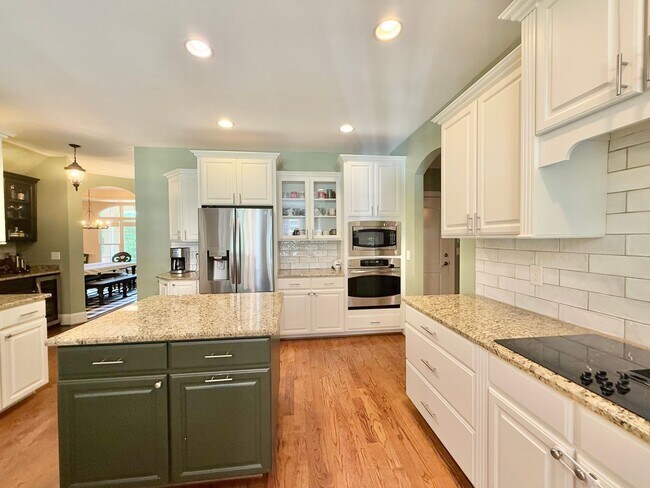 Building Photo - Luxurious 4BD, 3.5BA North Raleigh Home on...