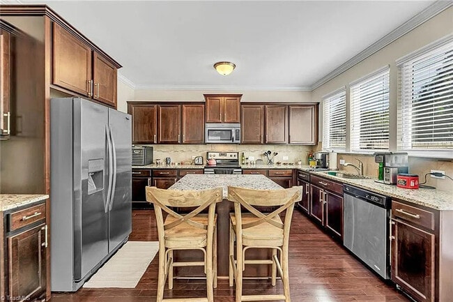 Building Photo - Earn Wealth While Leasing - Like a Homeown...