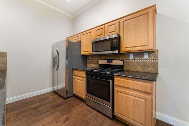 Building Photo - Upgraded condo in gated community