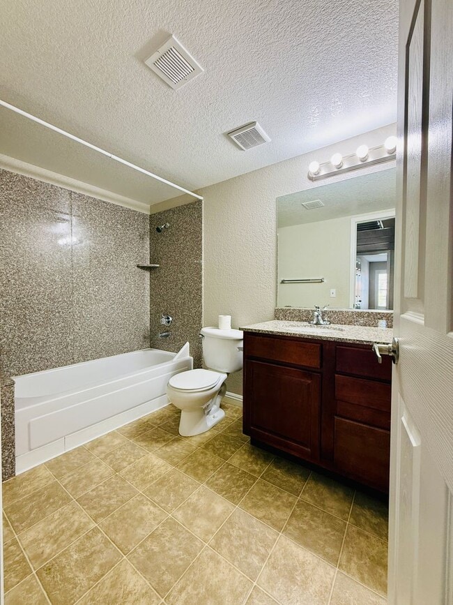 Building Photo - Fully Renovated 2-Bedroom Condo in Gated W...