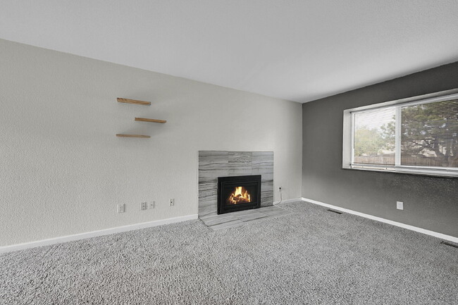 Building Photo - $1,495, 2-bed, 1.5 bath Unit in CO Springs with Assigned Parking Spot.