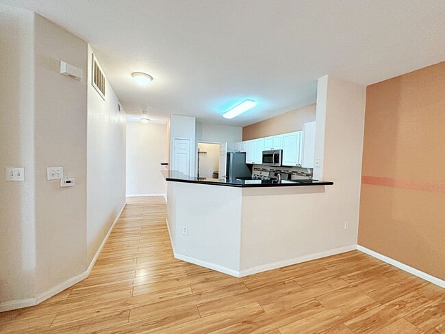 Building Photo - 3 BEDROOM CONDO IN  GUARD GATED COMMUNITY