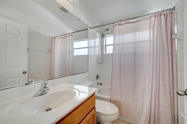 Building Photo - Stunning 4/3 with Fence Enclosed Yard in t...