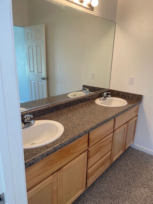 Building Photo - 3 Bedroom, 2 Bathroom House with a 2-Car Garage