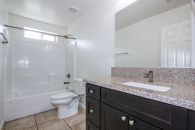 Building Photo - Three Bedroom Duplex