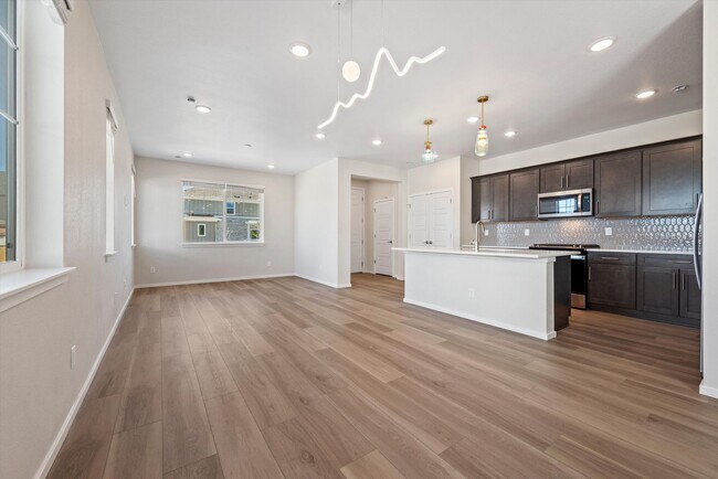 Building Photo - Stunning new-construction home in Aurora, CO, where modern design meets everyday comfort.