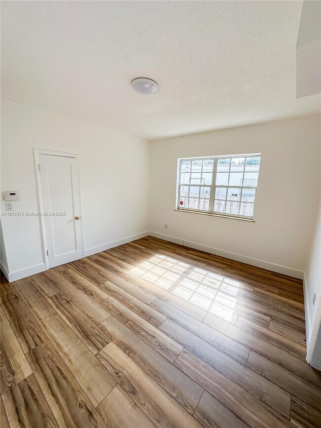 Building Photo - 8926 Dickens Ave