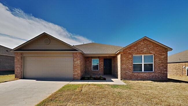 Building Photo - Very Nice 4 bedroom 2 bath home in Harrah ...