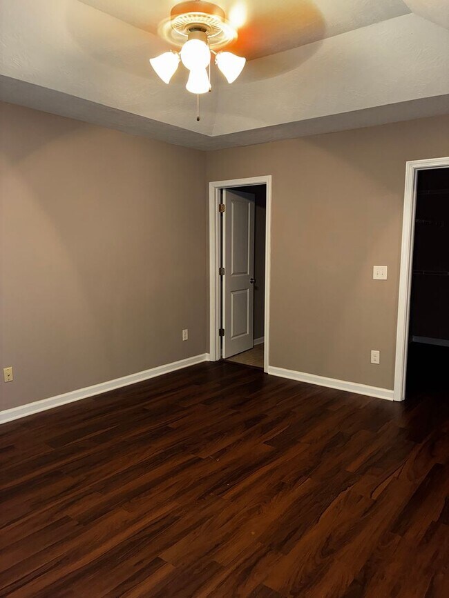 Building Photo - Of course! The marketing title iElegant 3-Bedroom Townhouse with Modern Comforts.