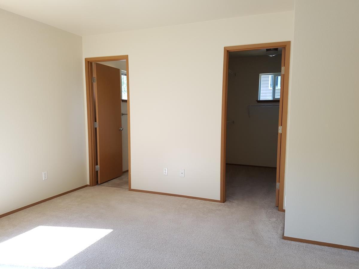 bathroom and walk-in closet in master bedroom - 2413 106th Dr SE