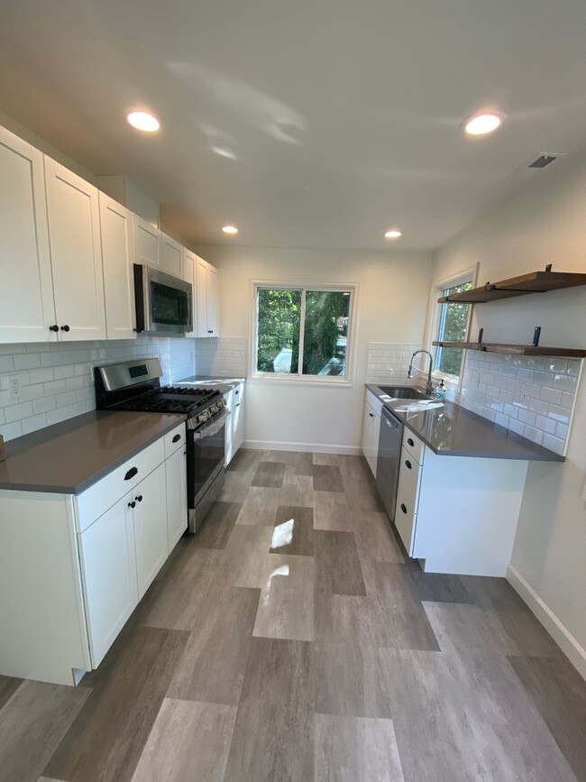 Building Photo - Remodeled Seattle Home on a corner lot, Av...