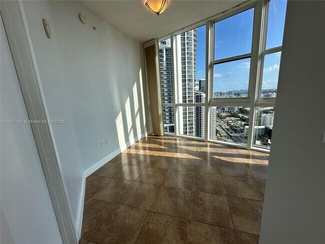 Building Photo - 18201 Collins Ave
