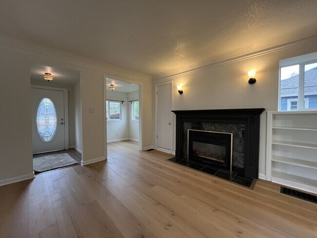 Building Photo - Character-Filled Concordia Home with Flexible Living Spaces & Gas Fireplace