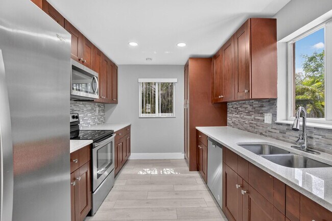 Building Photo - 6281 NW 14th Ct