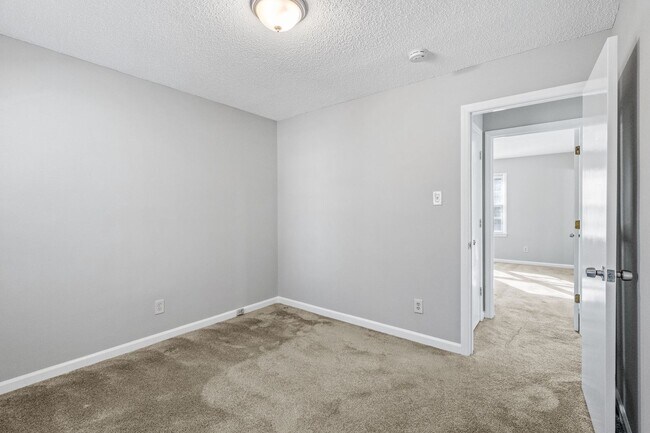 Building Photo - NE Home - Updated Kitchen and Bathrooms!  SS Appliances, Fire Place, Front Porch & Deck, Fenced Y...