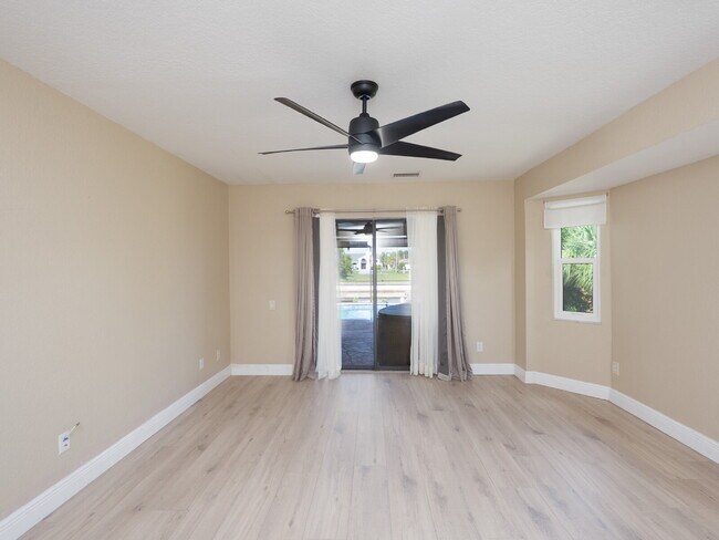 Building Photo - 3 BEDROOM • 2 BATHROOM • PRIVATE POOL • WATERFRONT • BOAT LIFT • ZERO DEPOSIT MOVE-IN AVAILABLE