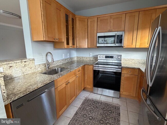 Building Photo - 1600 Spring Gate Dr.