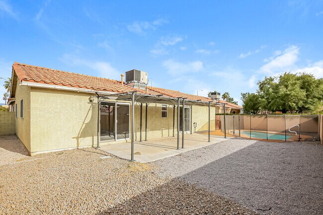 Building Photo - 7125 W Tropical Island Cir