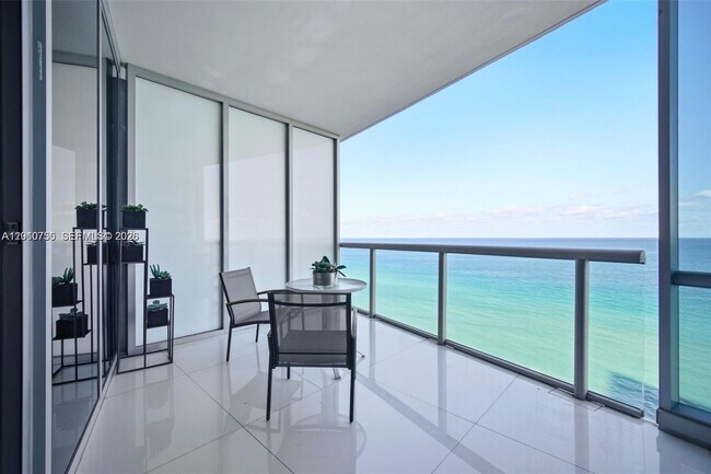 Building Photo - 17121 Collins Ave