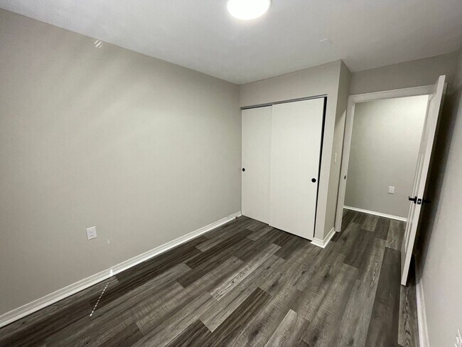Building Photo - Oversized 3 Bedroom with laundry room!