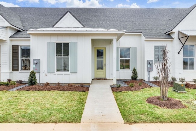 Building Photo - Brand New Upscale Single Story Townhome with private office