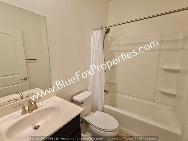 Building Photo - 7860 N Scholes Ave