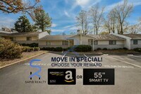 Building Photo - Move in before December 15th and choose your reward: a $250 Amazon Gift Card or a 55" Smart TV!