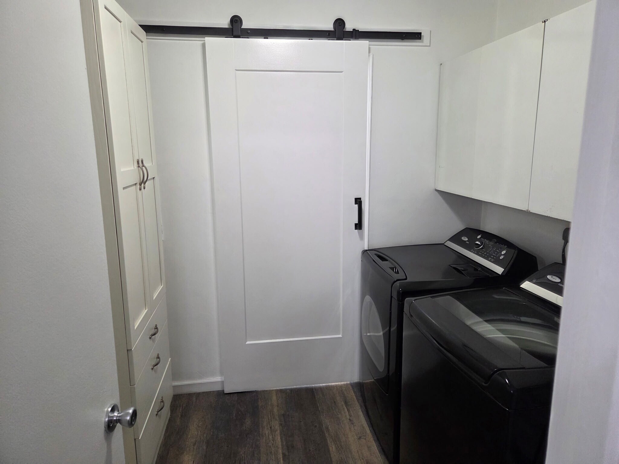 Laundry room and barn door to 2nd bathroom - 1802 Edmund Ave NE