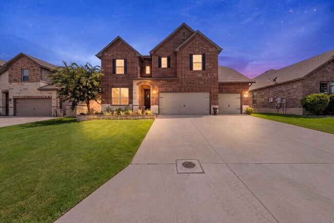 Building Photo - No Rear Neighbors, 3 Car Garage, a Chef's Kitchen, and Room for Everyone