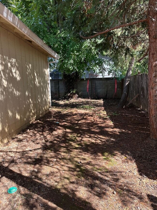 Building Photo - Charming Redding Home with Fireplace & Vau...