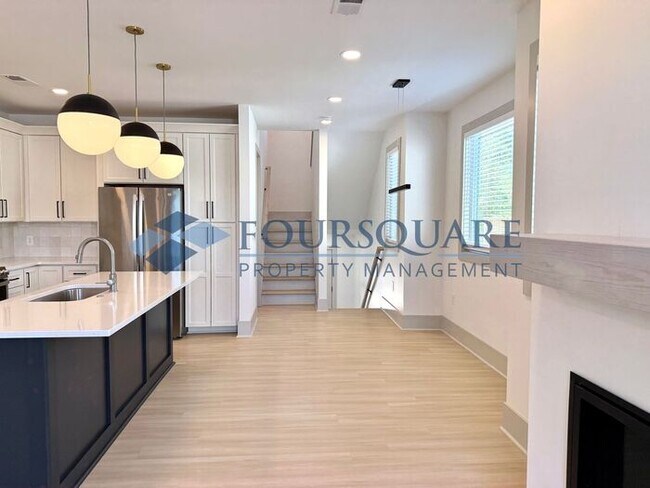 Building Photo - Modern 4-Bed Townhome with Designer Finishes, Dual Balconies & EV-Ready Garage – Inside the Beltl...