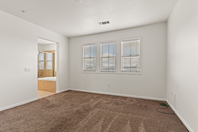 Building Photo - Spacious 3-Bedroom Dublin Townhome with Private Balcony & Fireplace