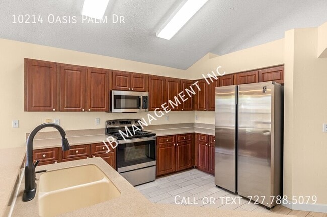 Building Photo - 10214 Oasis Palm Dr