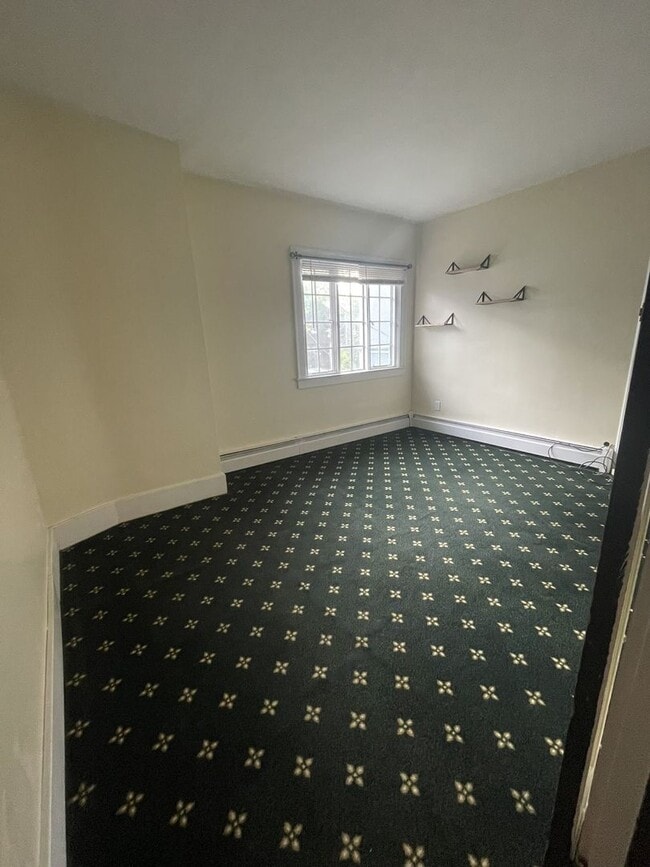 Building Photo - One Block to the Diag! Charming Home with Private Courtyard + Parking