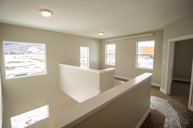 Looking over bonus room on staris - 84 Alpine Trl
