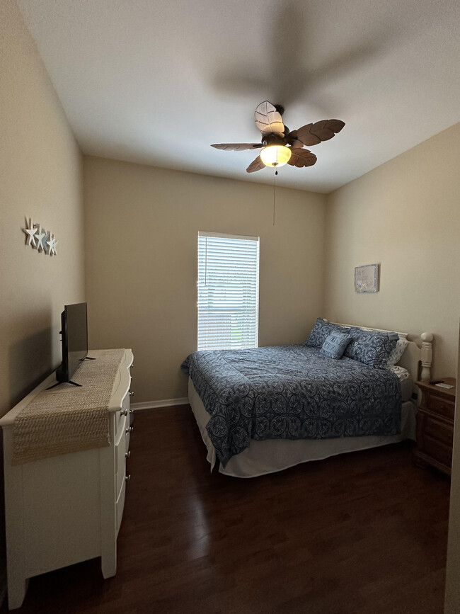 Bedroom 2 with queen bed and smart tv - 1305 SW 11th Plz