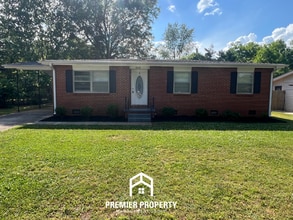 Building Photo - Charming 3BR/1.5BA in West Huntsville | Hardwood Floors Throughout & Fenced Yard
