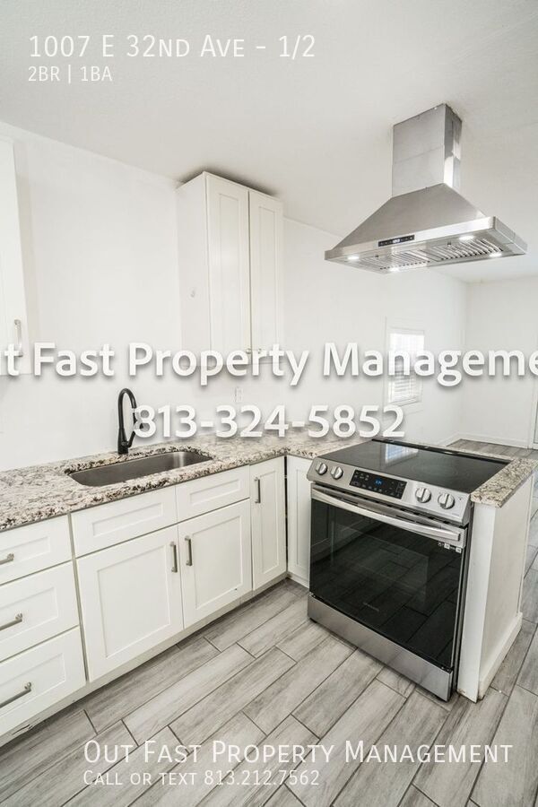 Building Photo - 1007 E 32nd Ave