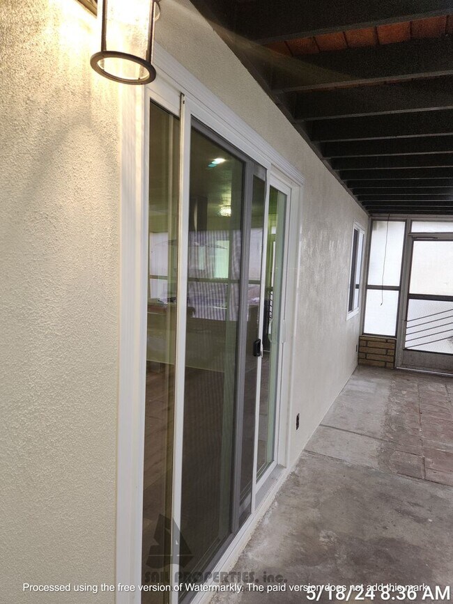 Building Photo - Welcome to this stunning 4-bedroom, 3-bath...