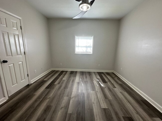 Building Photo - Welcome to this stunning 4-bedroom, 2-bath...