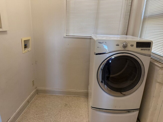 Building Photo - 4 Br, 2 Ba with kitchen appliances and basement for added storage.