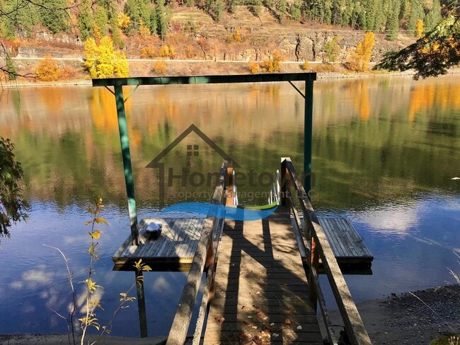 Building Photo - Riverfront Home on .62 acre Lot with Dock ...