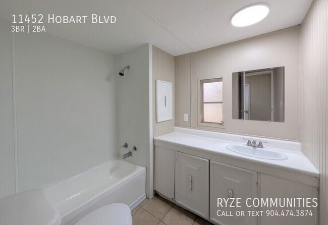 Building Photo - 11452 Hobart Blvd