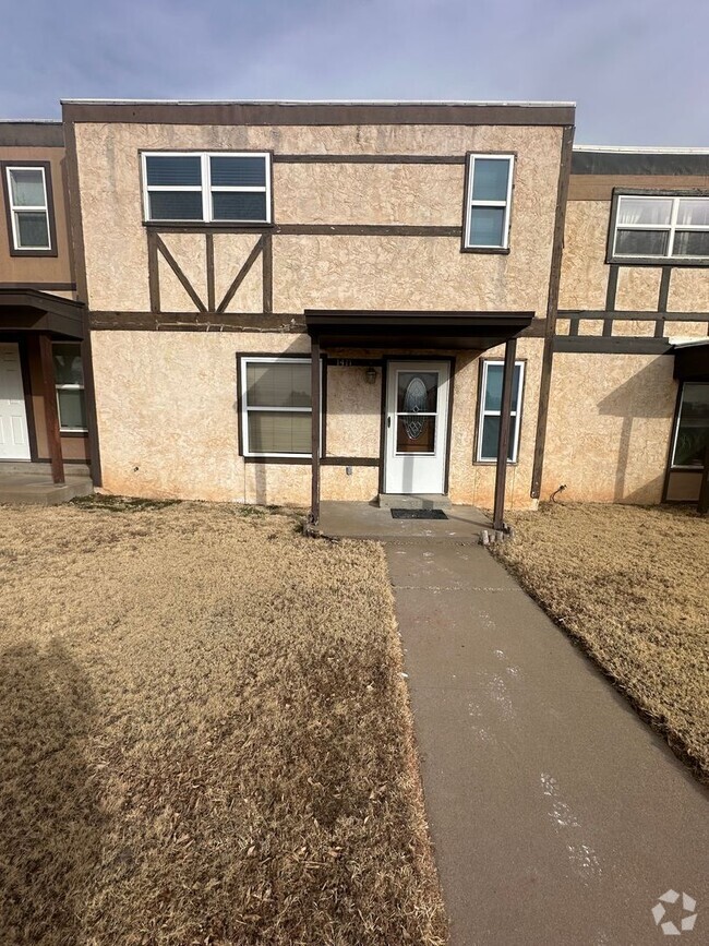 Building Photo - Spacious 2 Bed Condo! Fully Fence Backyard...