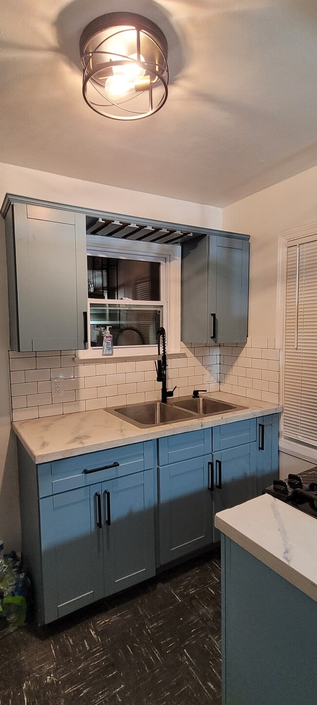 Concrete countertops and tiled backsplash - 19928 Ashton Ave