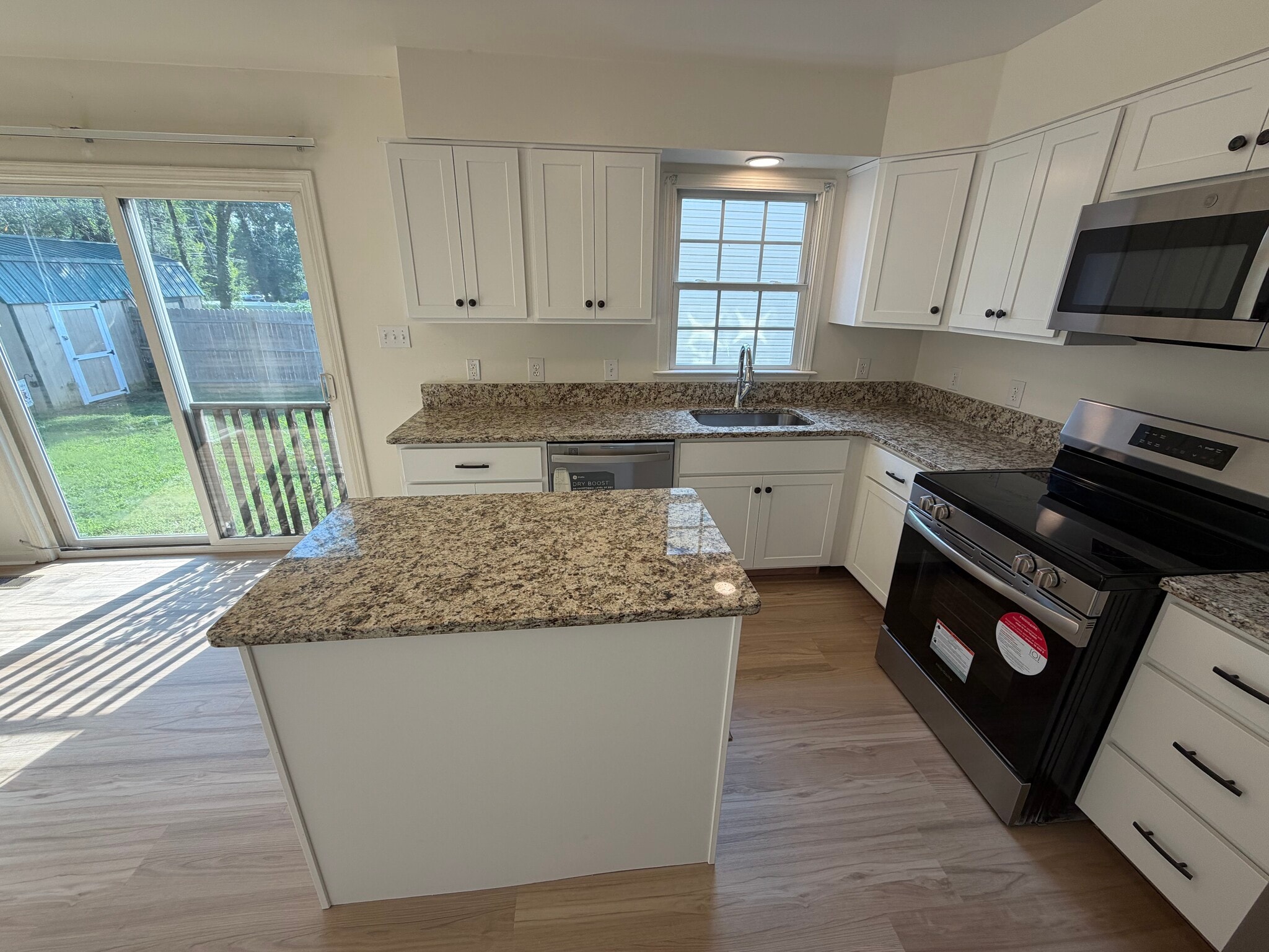 New cabinets, flooring, appliances - 903 Harwood Rd