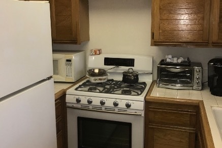 Kitchen with Fridge, Dishwasher & Microwave - 8500 Falmouth Ave
