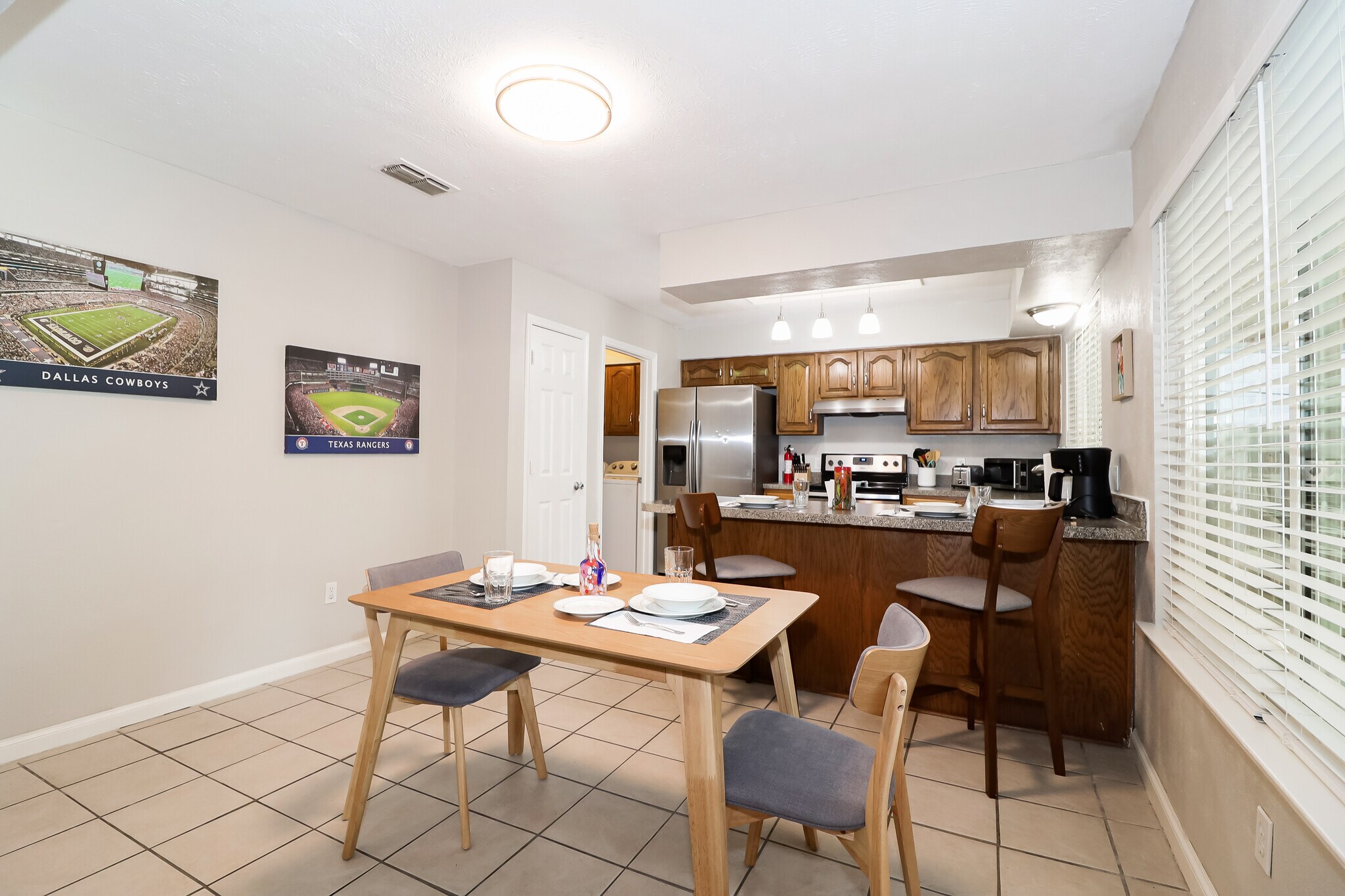 Dining room and kitchen. Kitchen is fully equipped. - 2507 Holt Road