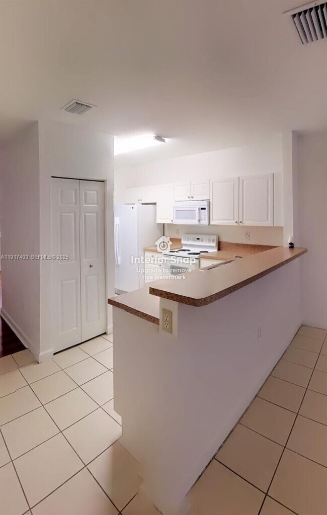 Building Photo - 3355 NE 13th Cir Dr