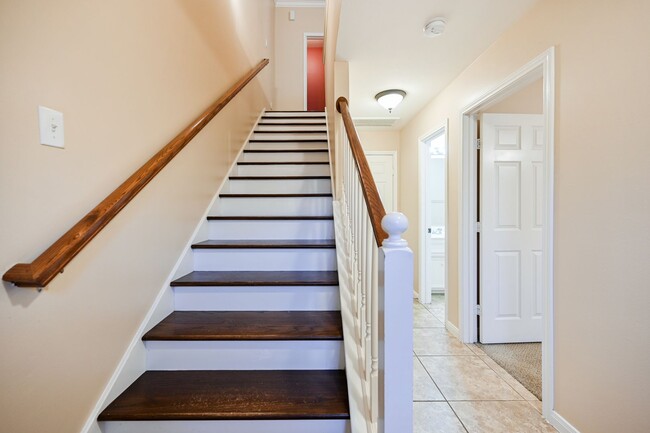 Building Photo - Gorgeous and spacious three-story townhome!